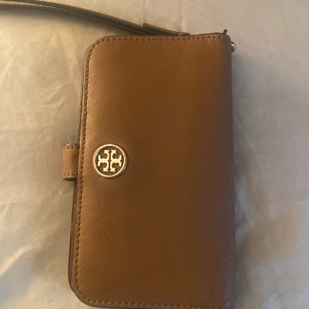 Tory Burch brown leather wristlet.Gently used.